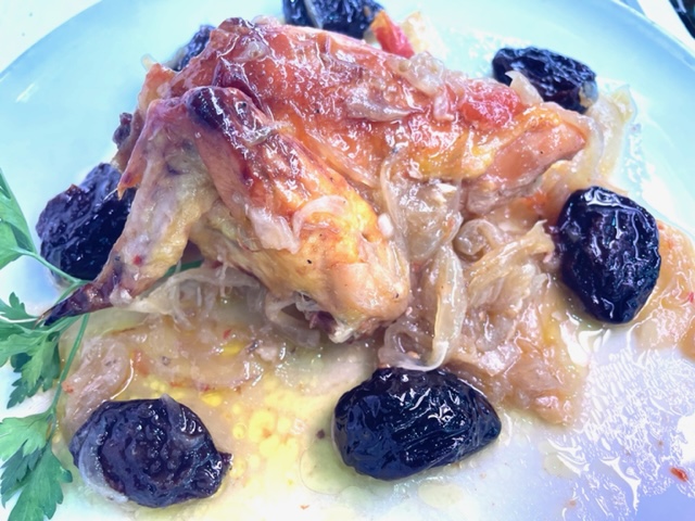 Baked chicken with plums.